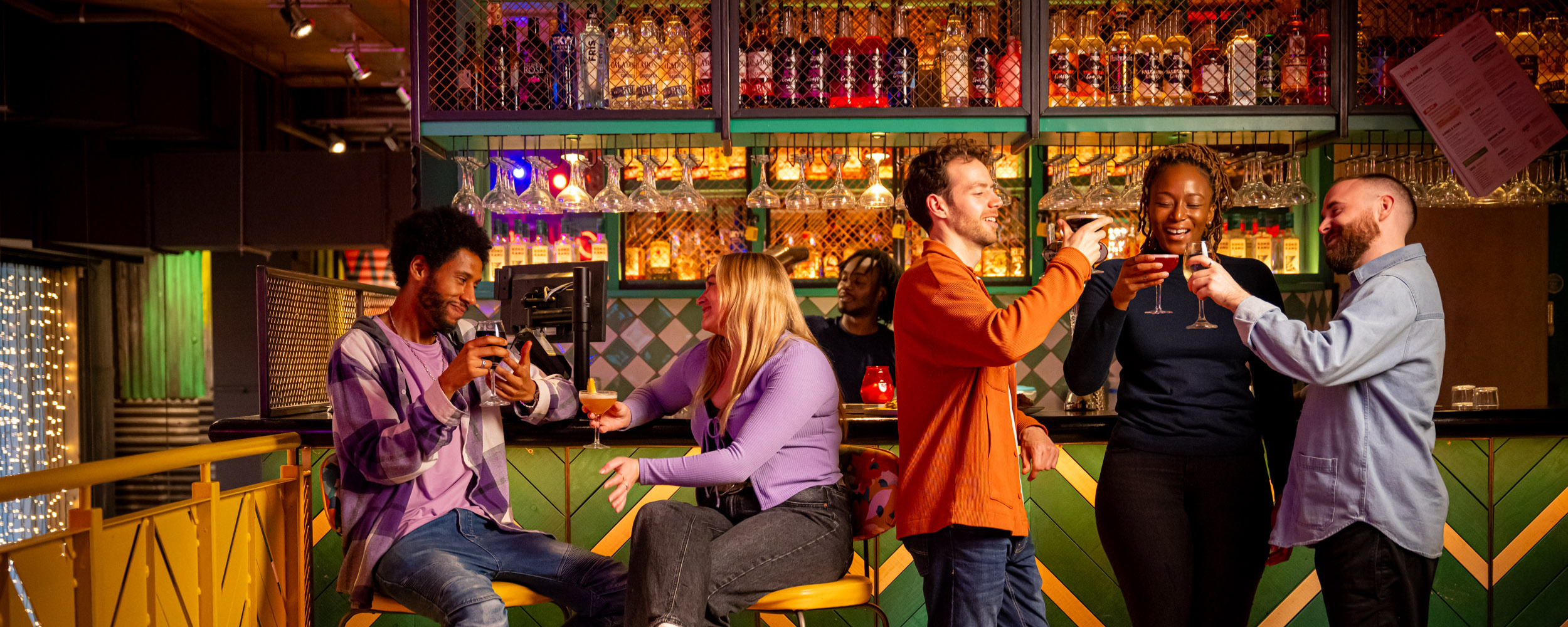 Group gathering at the bar
