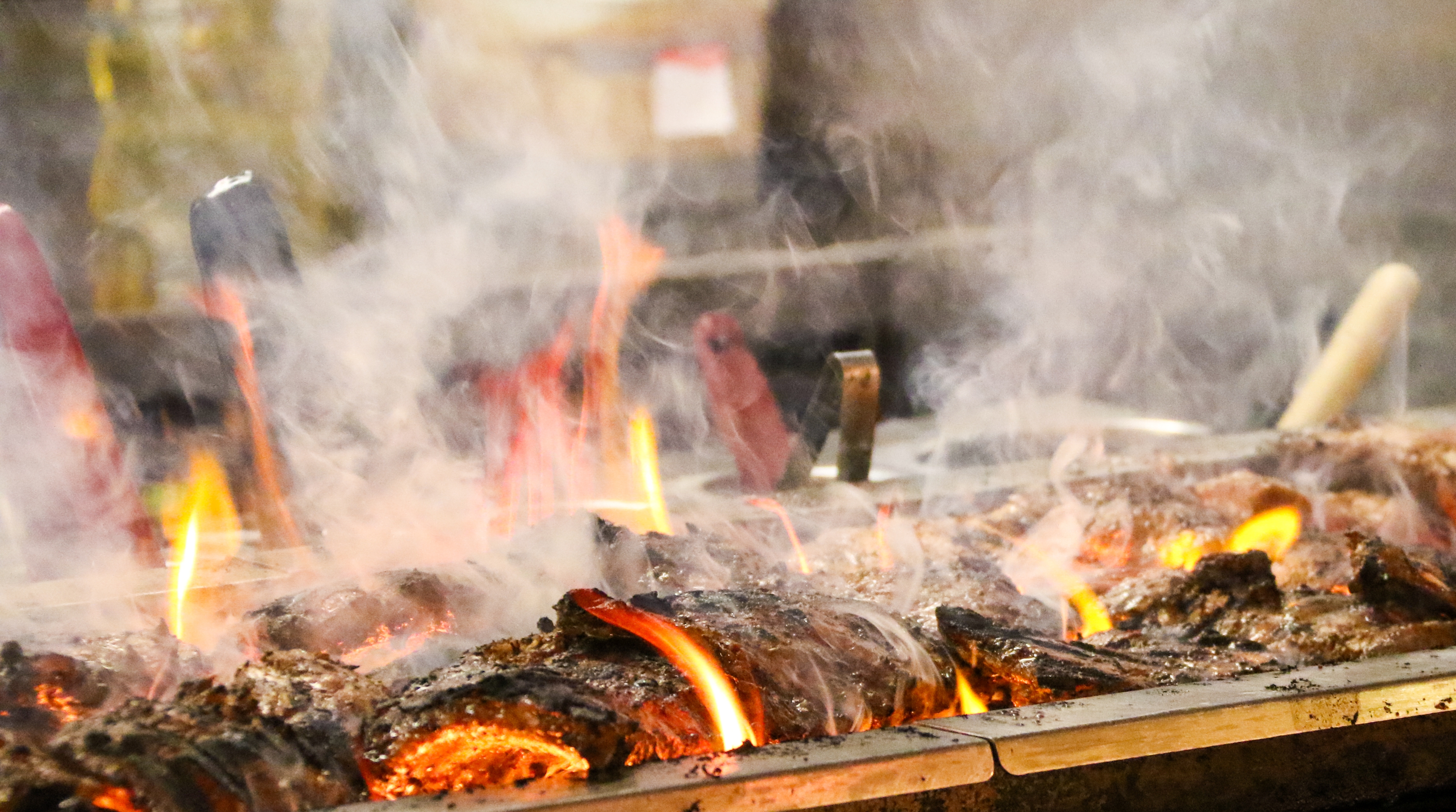 Jerk chicken on smoky jerk pit