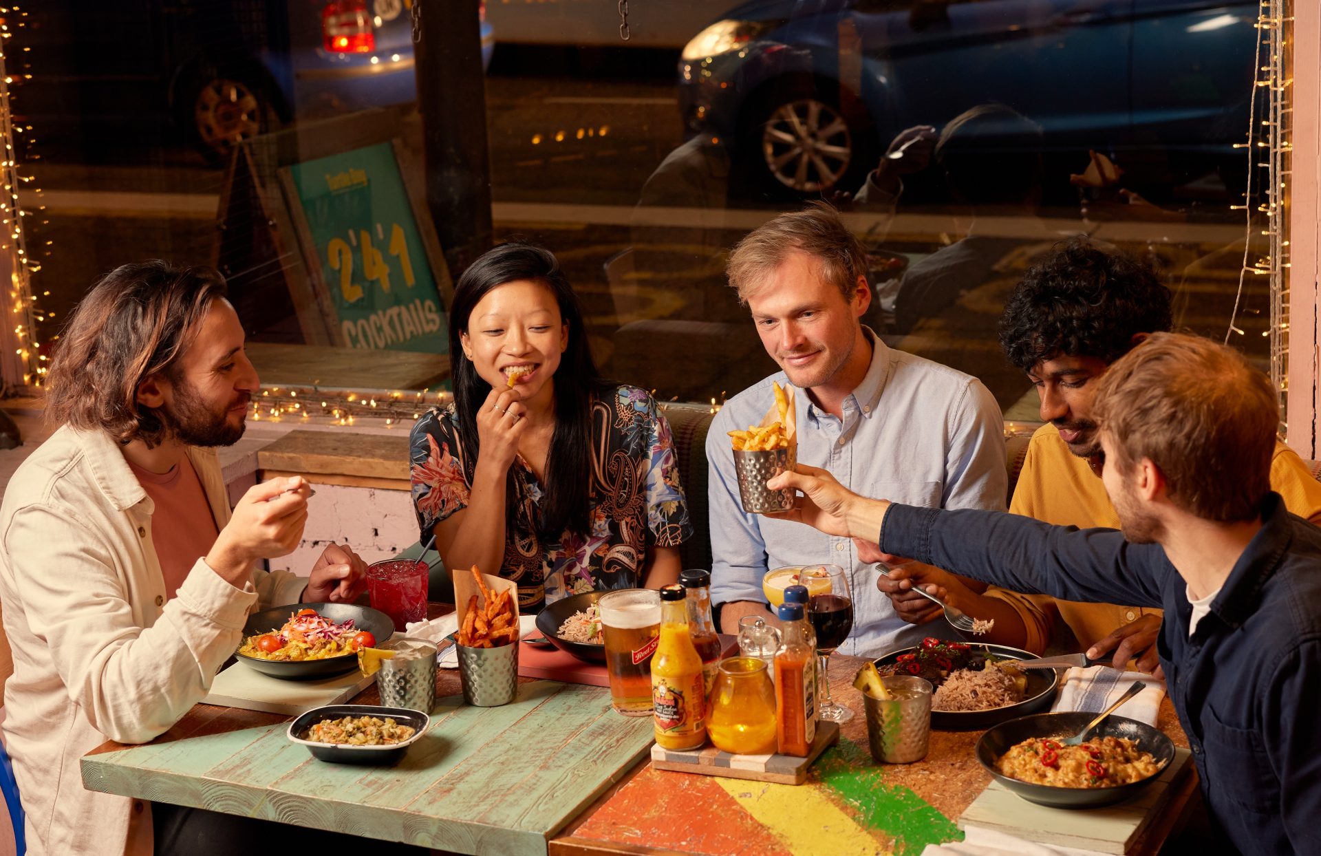Group of friends sharing food 5