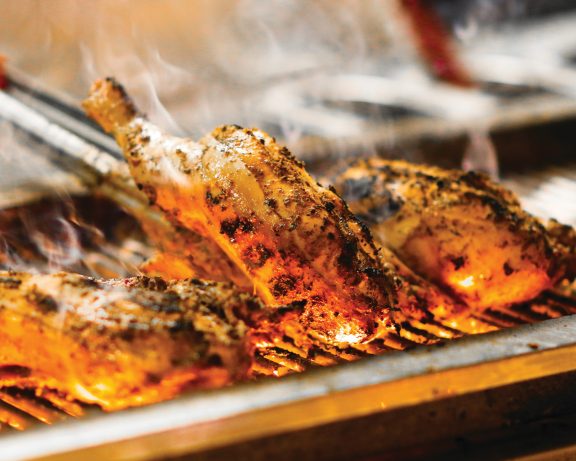 Jerk chicken grill chef cooking