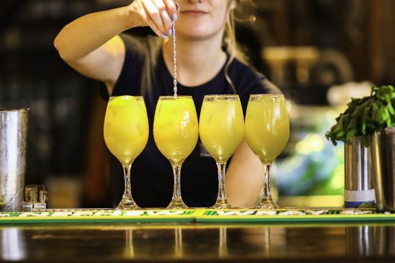 Bartender making cocktails